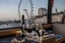 Dinner aboard the top-deck of a bus: Bustronome - London