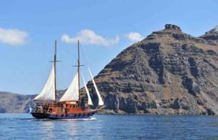 Traditional boat cruise to the volcanic islands of Santorini archipelago