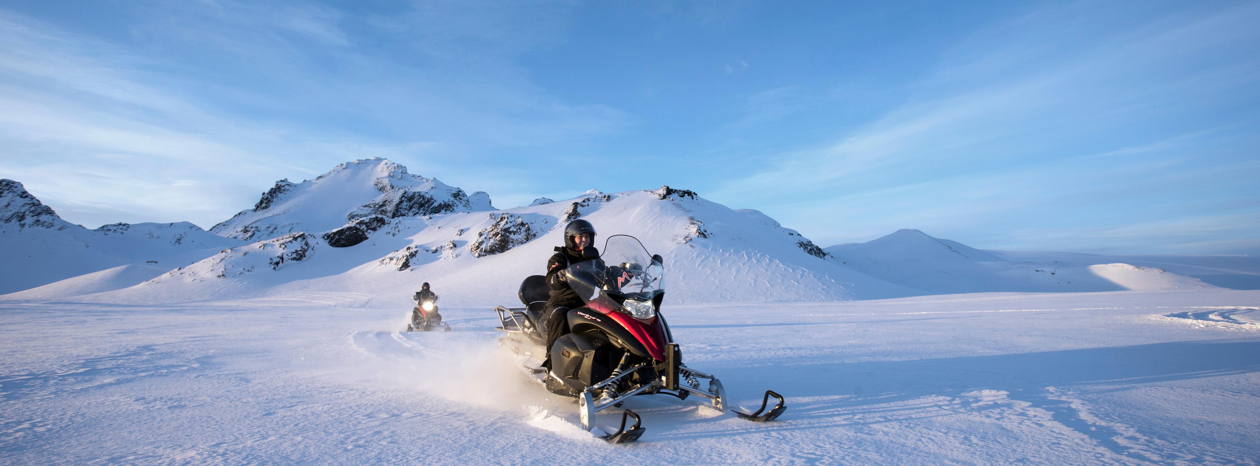 A day trip at Golden Circle with a snowmobile tour over the Langjökull glacier - leaving from Reykjavik