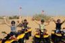 Quad bike driving in the dunes with BBQ dinner in a Bedouin camp